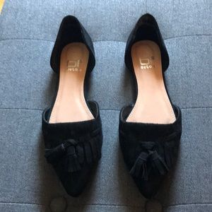 Black suede flats with tassel detail. Size 6.5.